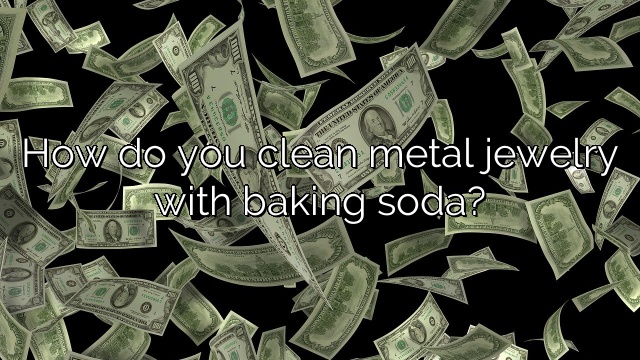 How do you clean metal jewelry with baking soda?