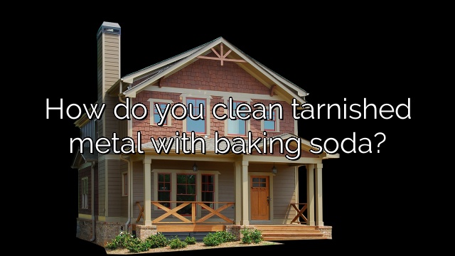 How do you clean tarnished metal with baking soda?